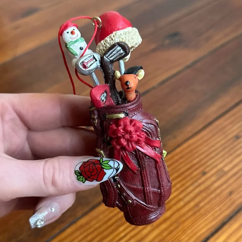 2009 red golf bag ornament w Santa hat, snowman, & clubs